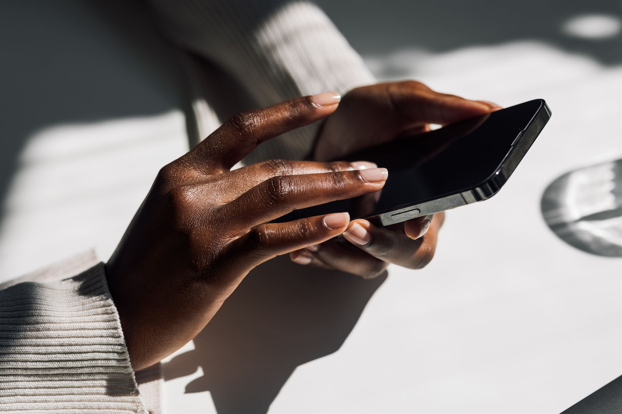 Close-up-of-person-using-smartphone